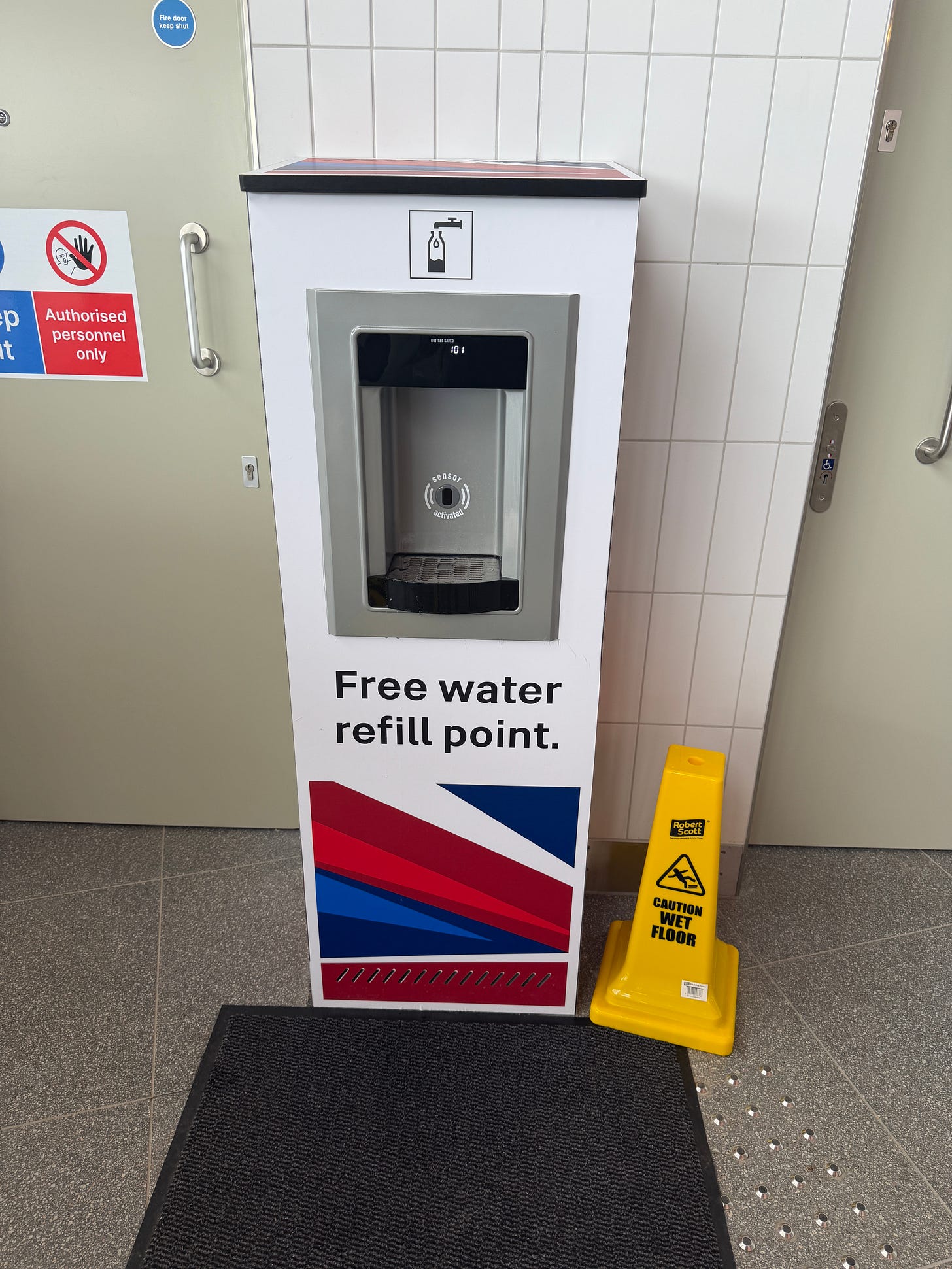 Photo of a GBR liveried water bottle refilling station.