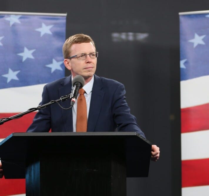 U.S. Rep. Dusty Johnson, R-South Dakota, (left) and Democratic challenger, Sheryl Johnson, face off in a debate on Oct. 15, 2024, in Sioux Falls. (Joshua Haiar/South Dakota Searchlight)