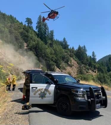 Helicopter over CHP vehicle. Helicopter over CHP vehicle.