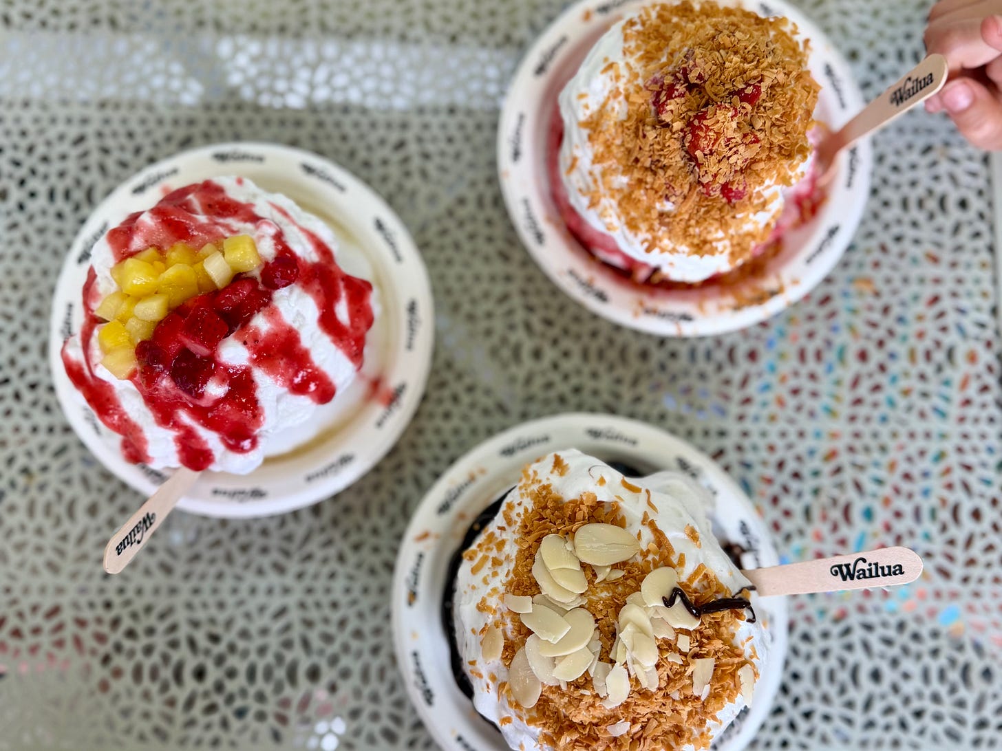 Fresh fruit shave ice with thick haupia coconut foam topping from Wailua Shave Ice in Kapa’a, Kauai.