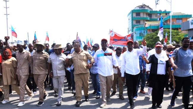 The party's deputy chairman, Tundu Lissu, front center, and supporters of Tanzania's main opposition party, CHADEMA, protest in Dar es Salaam, Tanzania, Wednesday, Jan. 24, 2024. The party's deputy chairman, Tundu Lissu, front center, and supporters of Tanzania's main opposition party, CHADEMA, protest in Dar es Salaam, Tanzania, Wednesday, Jan. 24, 2024.
