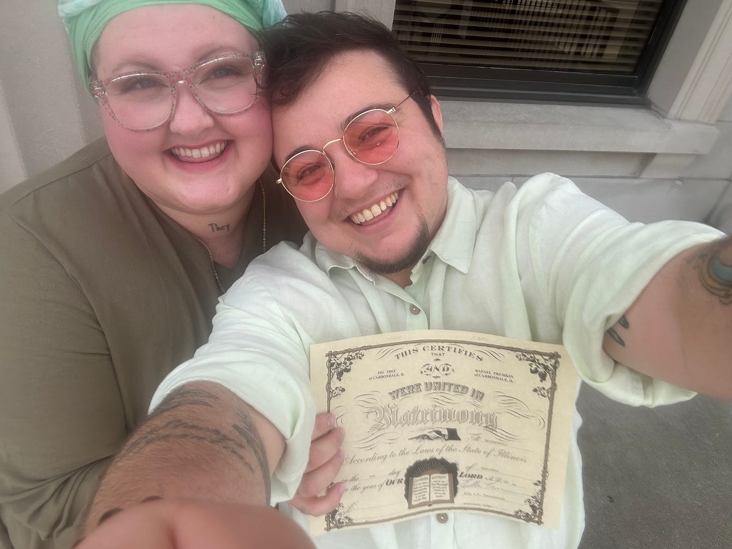 Me and Fig posing outside the courthouse with our marriage certificate Me and Fig posing outside the courthouse with our marriage certificate