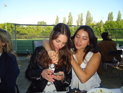 Graduates in front of an old chateau, five year high school reunion, five girls in Brussels