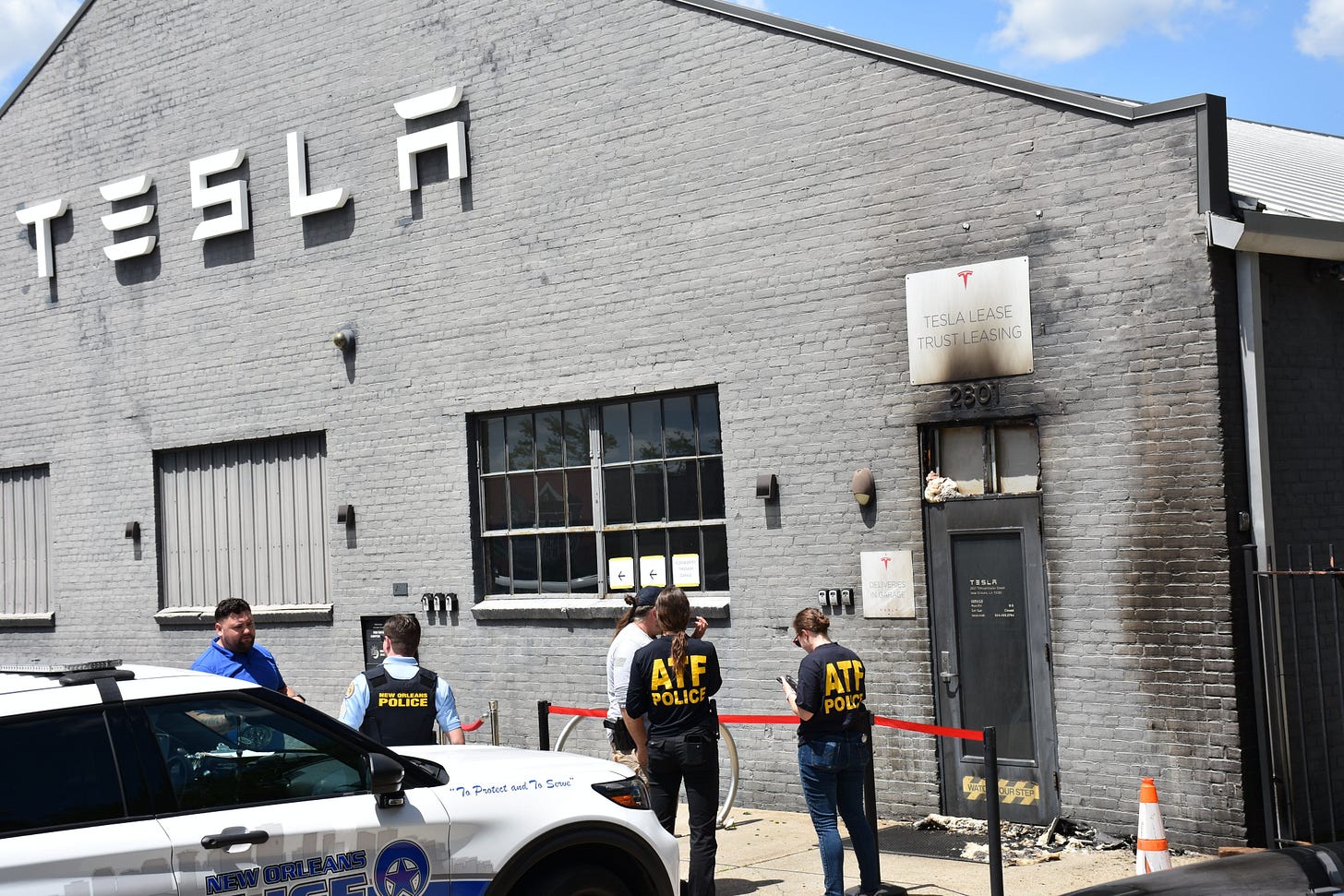 Molotov cocktail used to start fire at New Orleans Tesla sales office, ATF  says