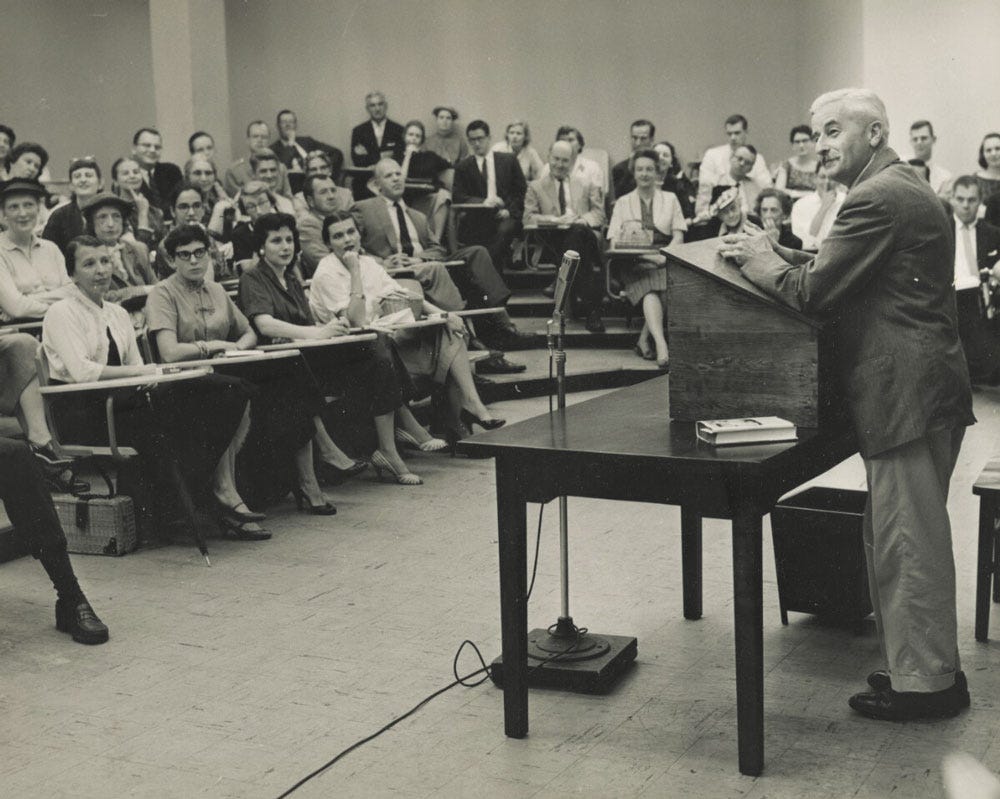 William Faulkner speaking to a classroom