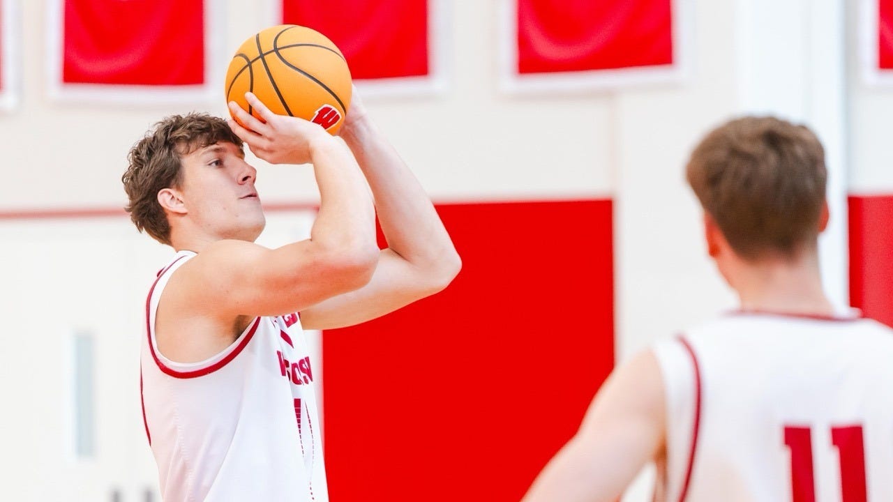 Wisconsin forward Will Garlock takes a shot during a preseason practice at the Badgers’ practice facility. Wisconsin forward Will Garlock takes a shot during a preseason practice at the Badgers’ practice facility.