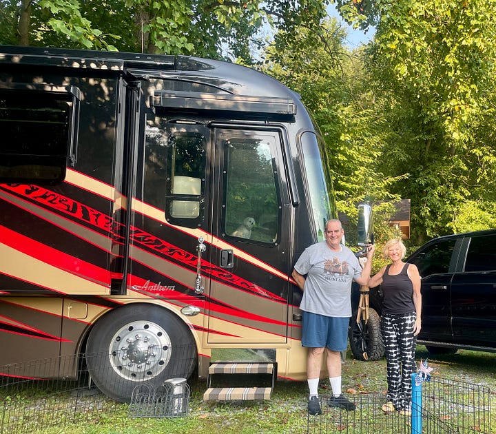 A photo of Mark & Kelly in front of their motorhome that matches ours, one with Tommy, Kelly & me playing games, my photo of Trump on stage at the Harrisburg rally and my commemorative button.