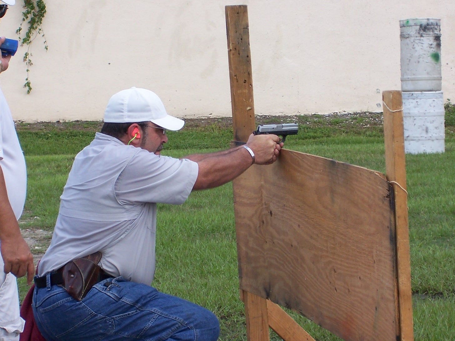 May be an image of 2 people and people skeet shooting