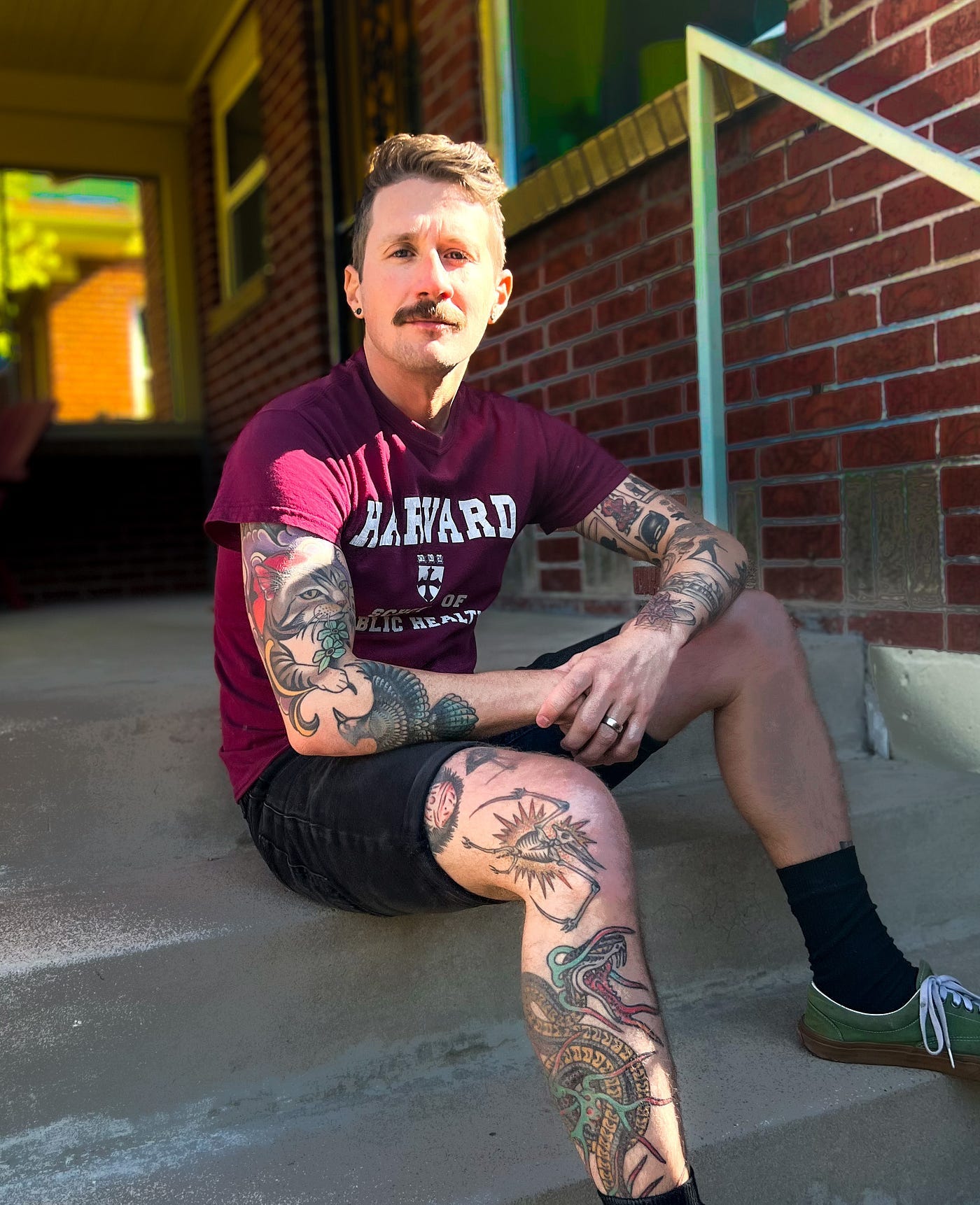 Author sitting on porch