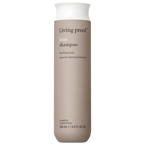 Champo Pitta volumising shampoo Living Proof No Frizz shampoo and Michael Van Clarke LifeSaver UV styling treatment bottles for an air dry summer hair routine