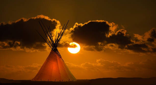 first nation teepee and autumn sunset - apache sunrise ceremony stock pictures, royalty-free photos & images
