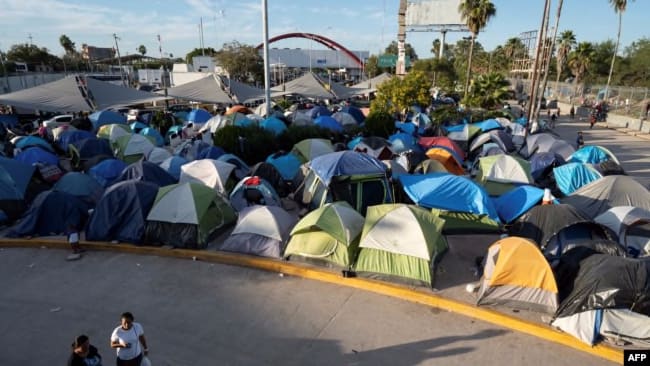 Migrants camp on the Mexican border just south of the Rio Grande, in Matamoros, Mexico, on November 1, 2019.