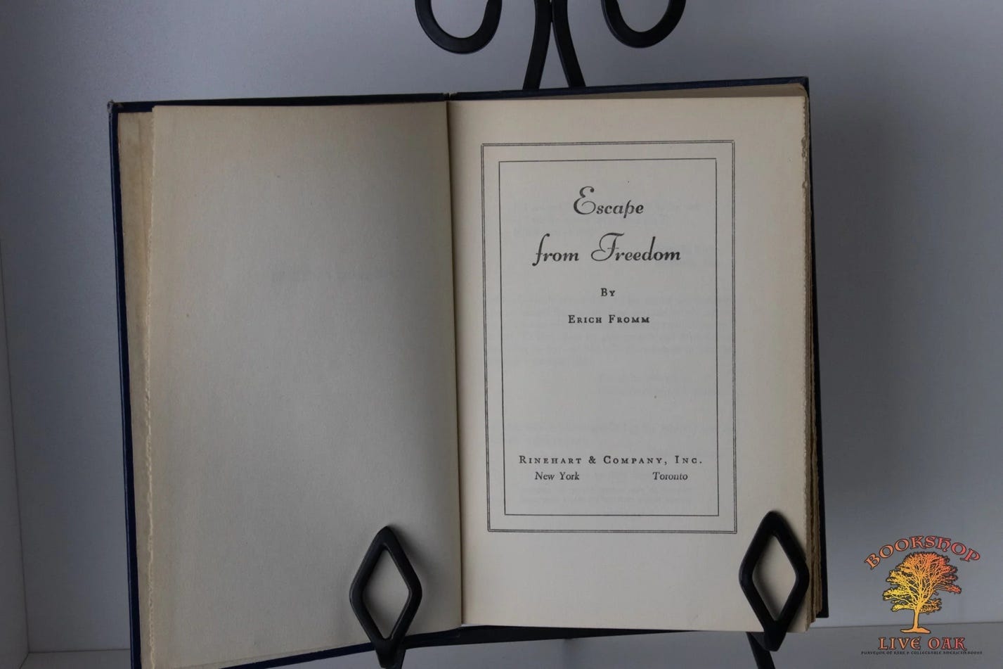 An open book on a stand

Description automatically generated