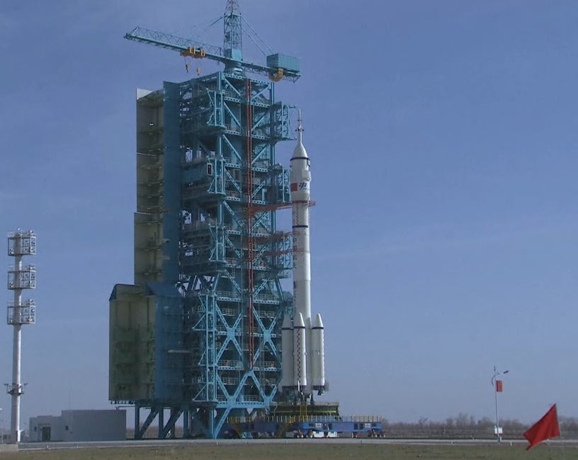 The Long March 2F/G Y22 vehicle standing prepared for launch with the Shenzhou-22 spacecraft from the Jiuquan Satellite Launch Center. The Long March 2F/G Y22 vehicle standing prepared for launch with the Shenzhou-22 spacecraft from the Jiuquan Satellite Launch Center.