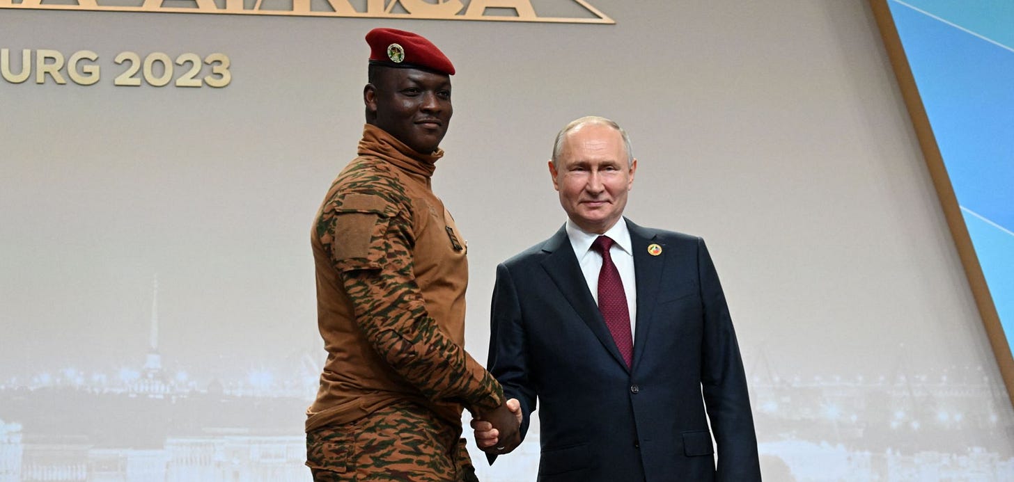 Russian President Vladimir Putin greets Burkina Faso's junta leader Capt. Ibrahim Traore during a welcoming ceremony at the second Russia-Africa summit in Saint Petersburg, Russia, on July 27, 2023. Russian President Vladimir Putin greets Burkina Faso's junta leader Capt. Ibrahim Traore during a welcoming ceremony at the second Russia-Africa summit in Saint Petersburg, Russia, on July 27, 2023.