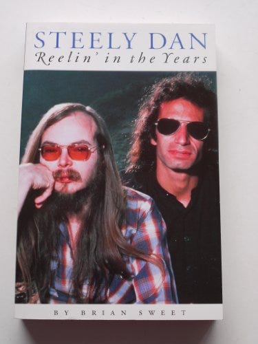 A book with a picture of two men

AI-generated content may be incorrect.