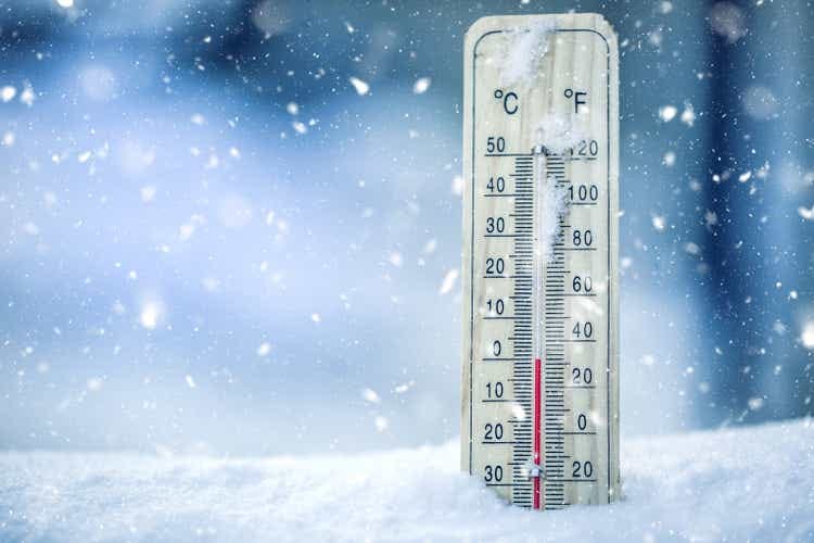 Thermometer on snow shows low temperatures - zero. Low temperatures in degrees Celsius and fahrenheit. Cold winter weather - zero celsius thirty two farenheit Thermometer on snow shows low temperatures - zero. Low temperatures in degrees Celsius and fahrenheit. Cold winter weather - zero celsius thirty two farenheit