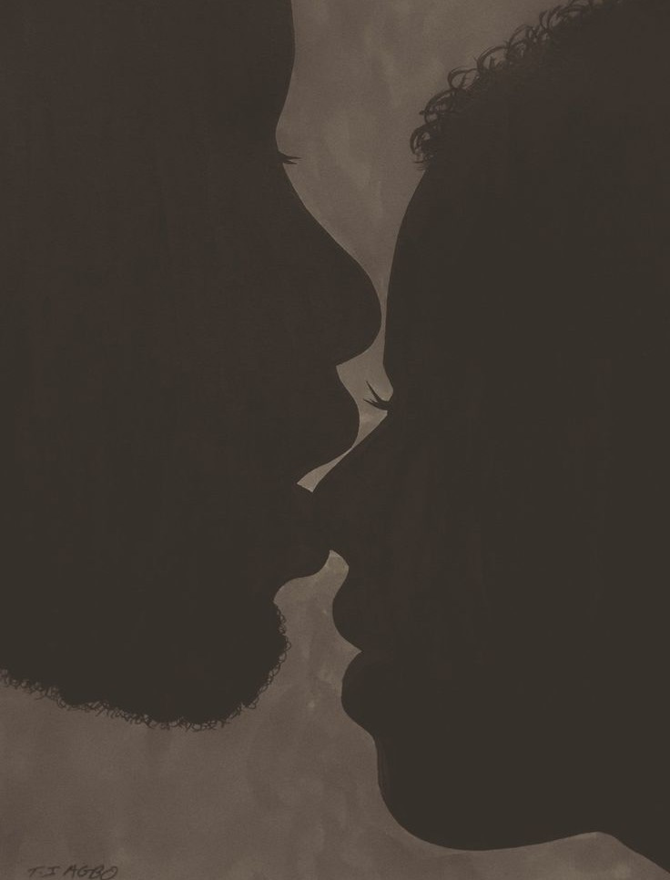 This may contain: the silhouette of two people kissing each other