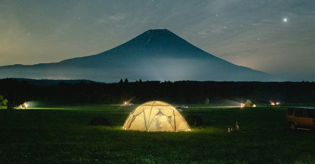 white tent under blue sky during night time
