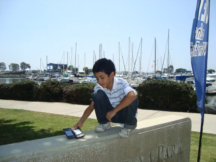 My brother and his DSi (circa. 2010)