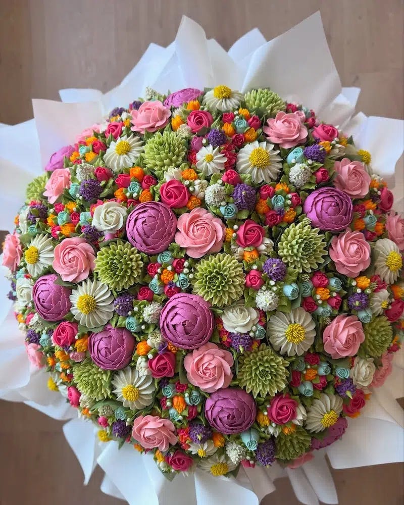 colorful bouquet of flowers made entirely of frosting.