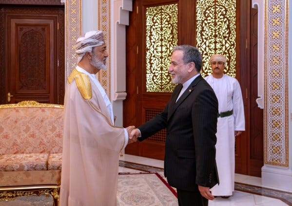 In this photo released by the Iranian Foreign Ministry, Iranian Foreign Minister Abbas Araghchi, right, shakes hands with Oman's Sultan Haitham bin Tariq during their meeting, in Muscat, Oman, Sunday, April 26, 2026. (Iranian Foreign Ministry via AP) In this photo released by the Iranian Foreign Ministry, Iranian Foreign Minister Abbas Araghchi, right, shakes hands with Oman's Sultan Haitham bin Tariq during their meeting, in Muscat, Oman, Sunday, April 26, 2026. (Iranian Foreign Ministry via AP)