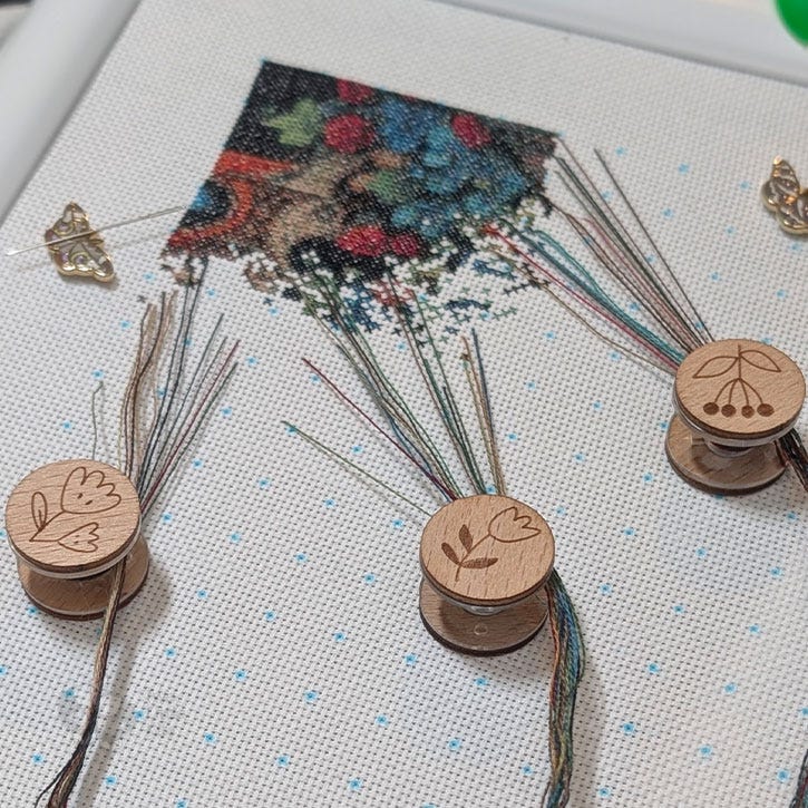 A work-in-progress cross-stitch that is full-coverage. The stitcher (Kate from Two Little Kits) is using parking and cross-country methods to complete this huge piece. A work-in-progress cross-stitch that is full-coverage. The stitcher (Kate from Two Little Kits) is using parking and cross-country methods to complete this huge piece.