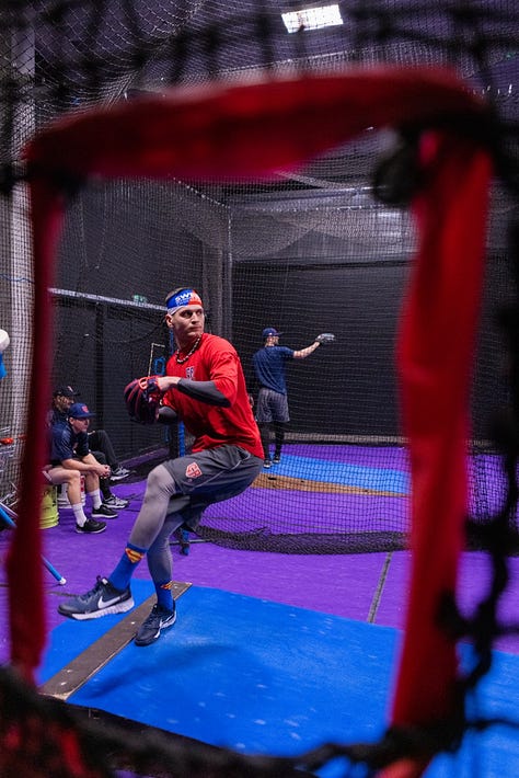 Martin Schneider, pitcher on the Czech National baseball team warms up during practice and poses for a portrait; Lukáš Erccoli, left, and Filip Smola, watch a funny video in the back of the van on the way to practice in Brno, Czechia.