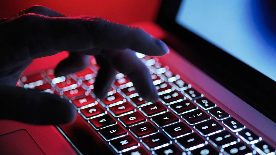 man using keyboard in 'online rape academy'