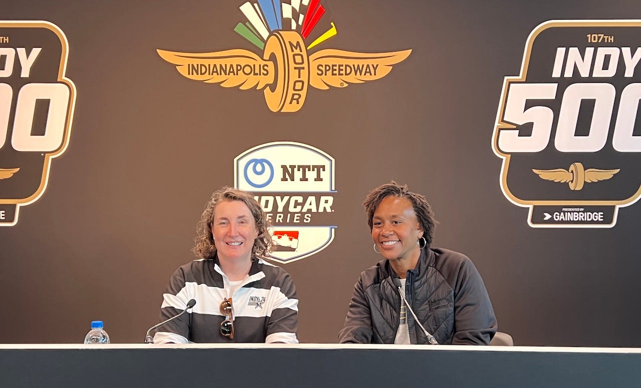 Mel Raines and Tamika Catchings sit at the press conference table with a backdrop filled with logos of IMS and the Indy 50. Mel Raines and Tamika Catchings sit at the press conference table with a backdrop filled with logos of IMS and the Indy 50.