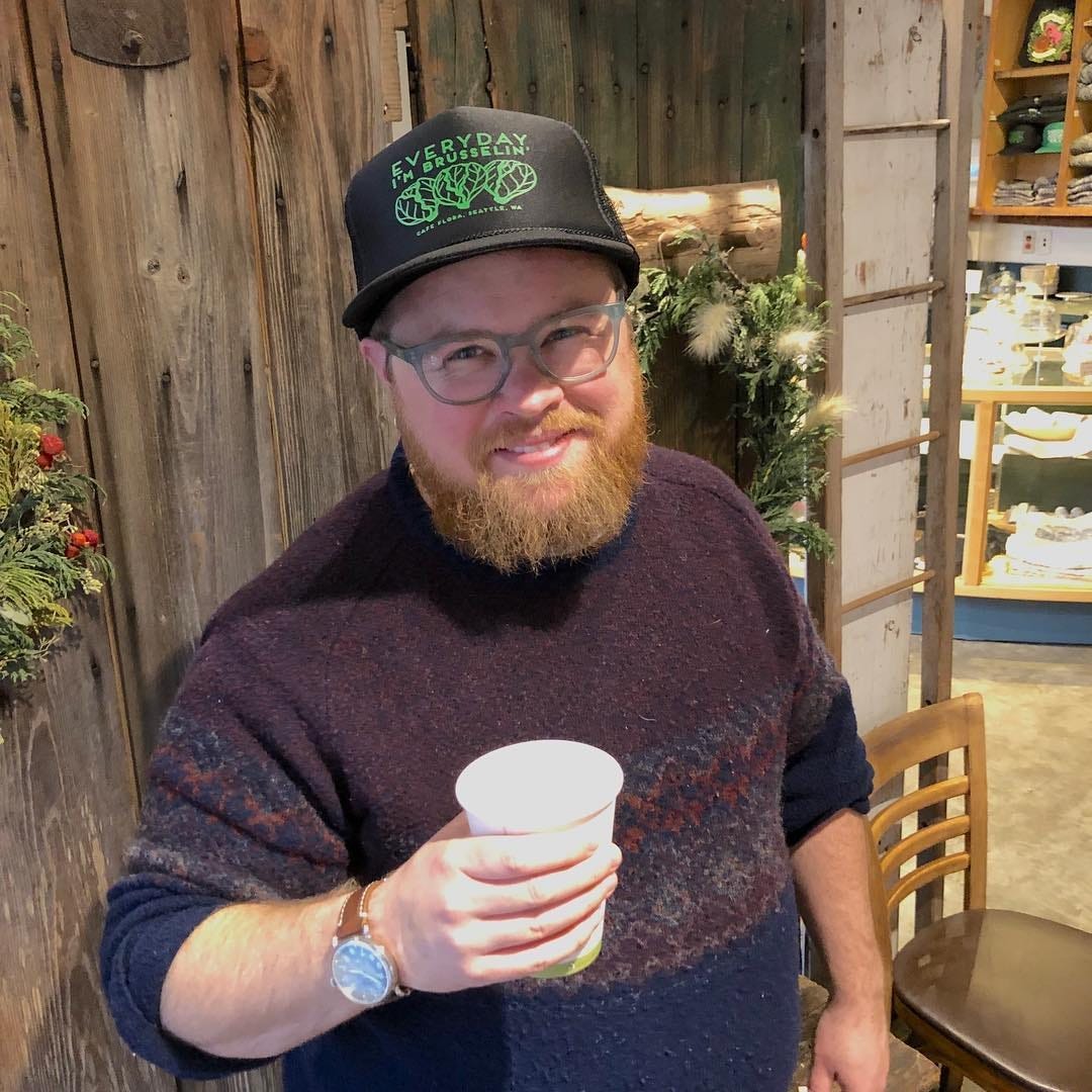 Nat drinking a coffee