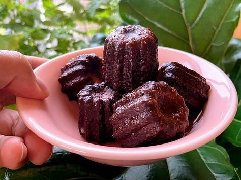 Comparison photo of caneles, Adobe Illustrator screenshot of canele zine, hand holding pink bowl of canele