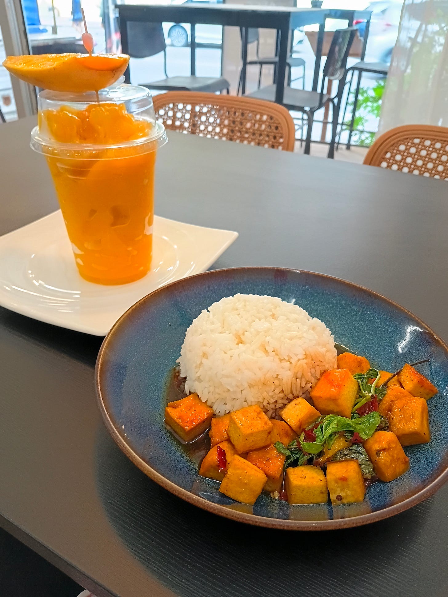 stir-fry tofu and a smoothie with mango stir-fry tofu and a smoothie with mango