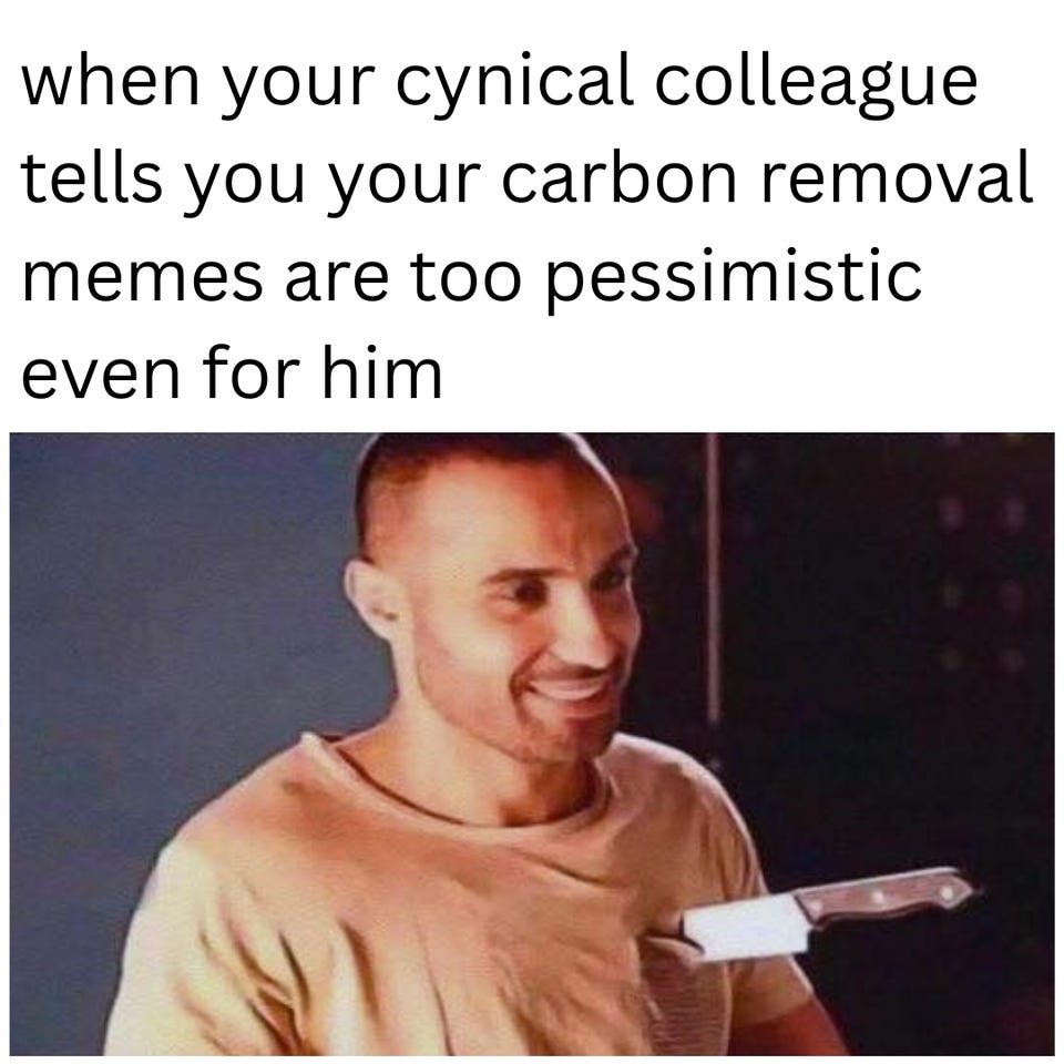 "when your cynical colleague tells you your carbon removal memes are too pessimistic even for him" above a man smiling while a knife is stuck in his chest.
