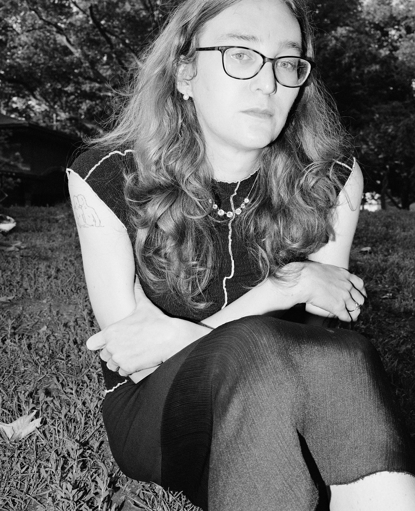 Grace Byron sitting outside