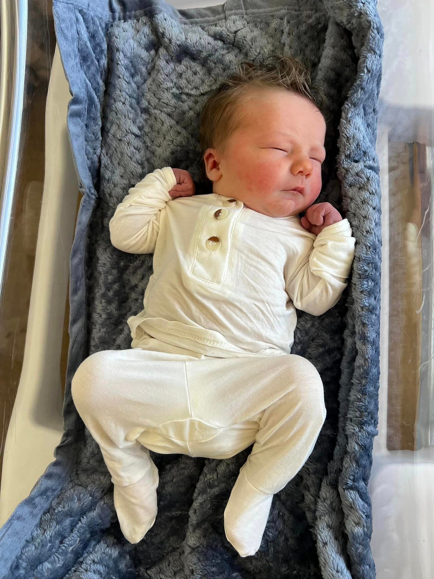 May be an image of 1 person, baby and indoor