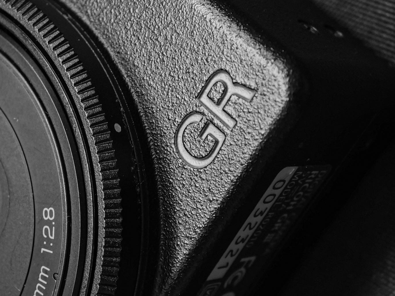 a close up of a camera with a lens