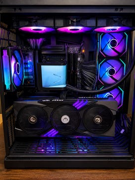 Custom-built desktop PC with RGB fans, liquid cooling, and an MSI GeForce RTX graphics card. Custom-built desktop PC with RGB fans, liquid cooling, and an MSI GeForce RTX graphics card.