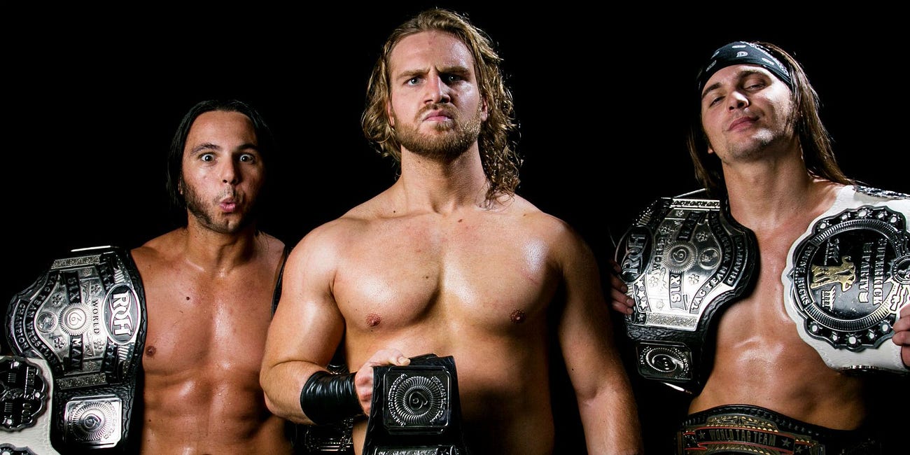 The Young Bucks on Hangman Page winning the AEW title