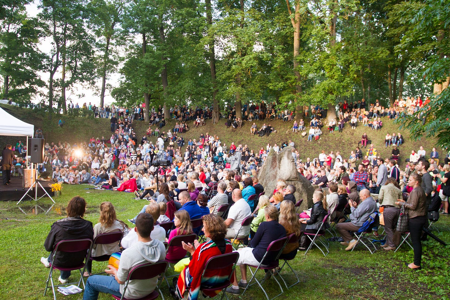 A large Arvamusfestival audience gathered on the wooded hillside at Orulava in Paide