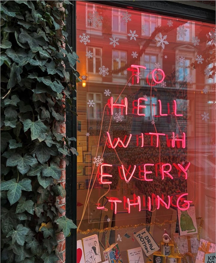 Vinyl records, neon window sign, mirror selfie, a living room with a giant disco ball