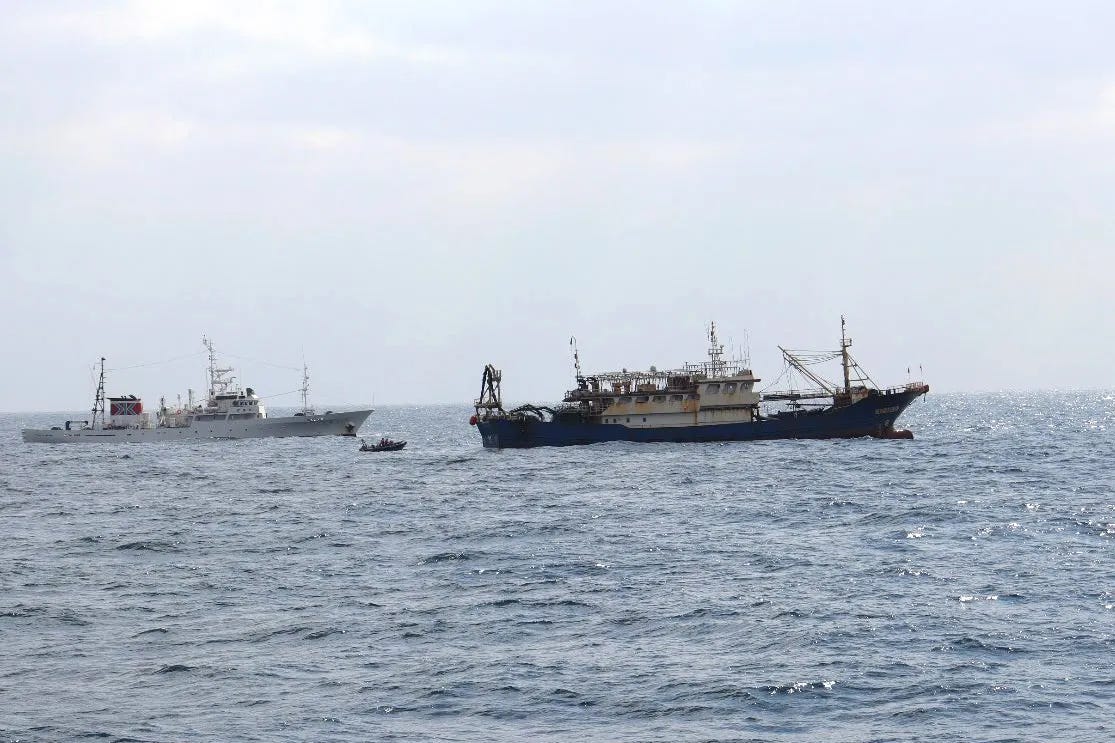 The Chinese fishing boat, right, seized by Japan’s Fisheries Agency's vessel. The Chinese fishing boat, right, seized by Japan’s Fisheries Agency's vessel.