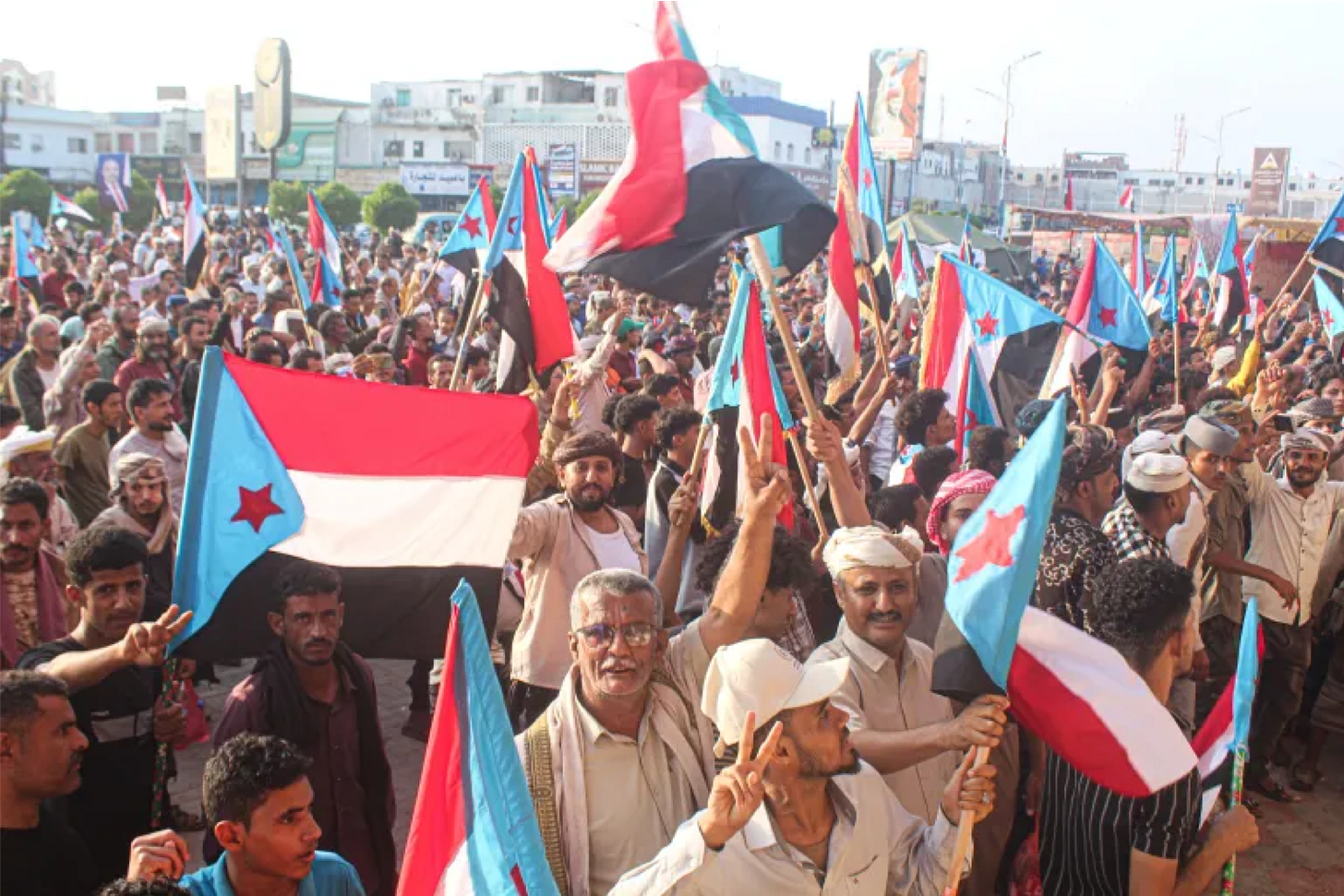 Yemenis supporters of the UAE-backed Southern Transitional Council (STC) in the coastal port city of Aden on December 8, 2025 [AFP]