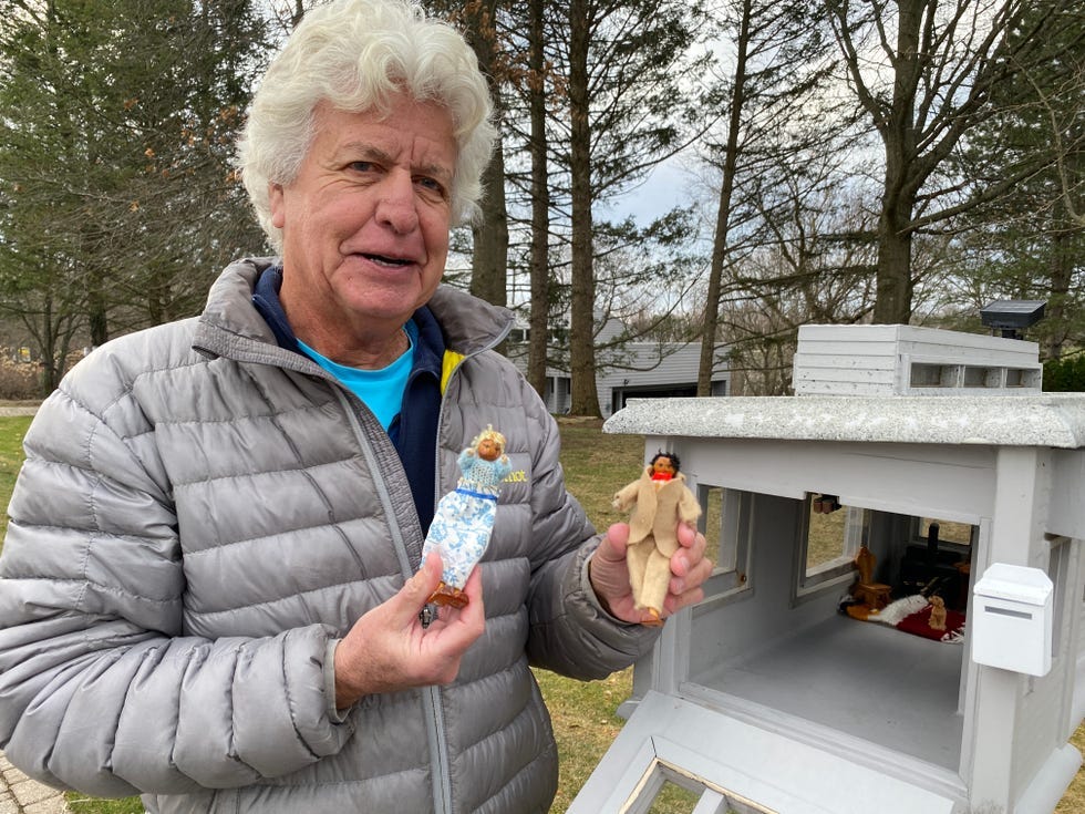 Don Powell, an Orchard Lake resident and Farmington Hills business owner, shows off his custom mailbox, where a mystery "family" showed up last August. Don Powell, an Orchard Lake resident and Farmington Hills business owner, shows off his custom mailbox, where a mystery "family" showed up last August.