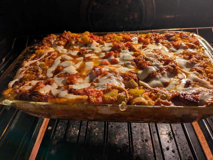 Finished, browned lasagna, and in the oven before browning top layer.