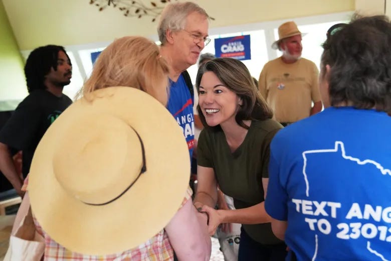 Angie Craig greeting supporters.