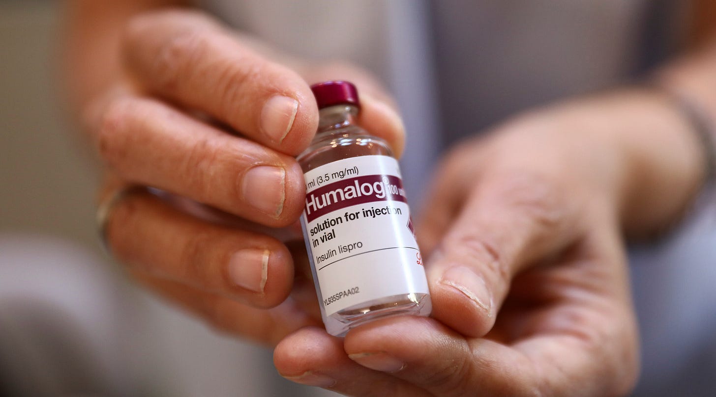 Photo of two hands holding that goddamn vial of insulin you wanted so fucking bad. Jesus.