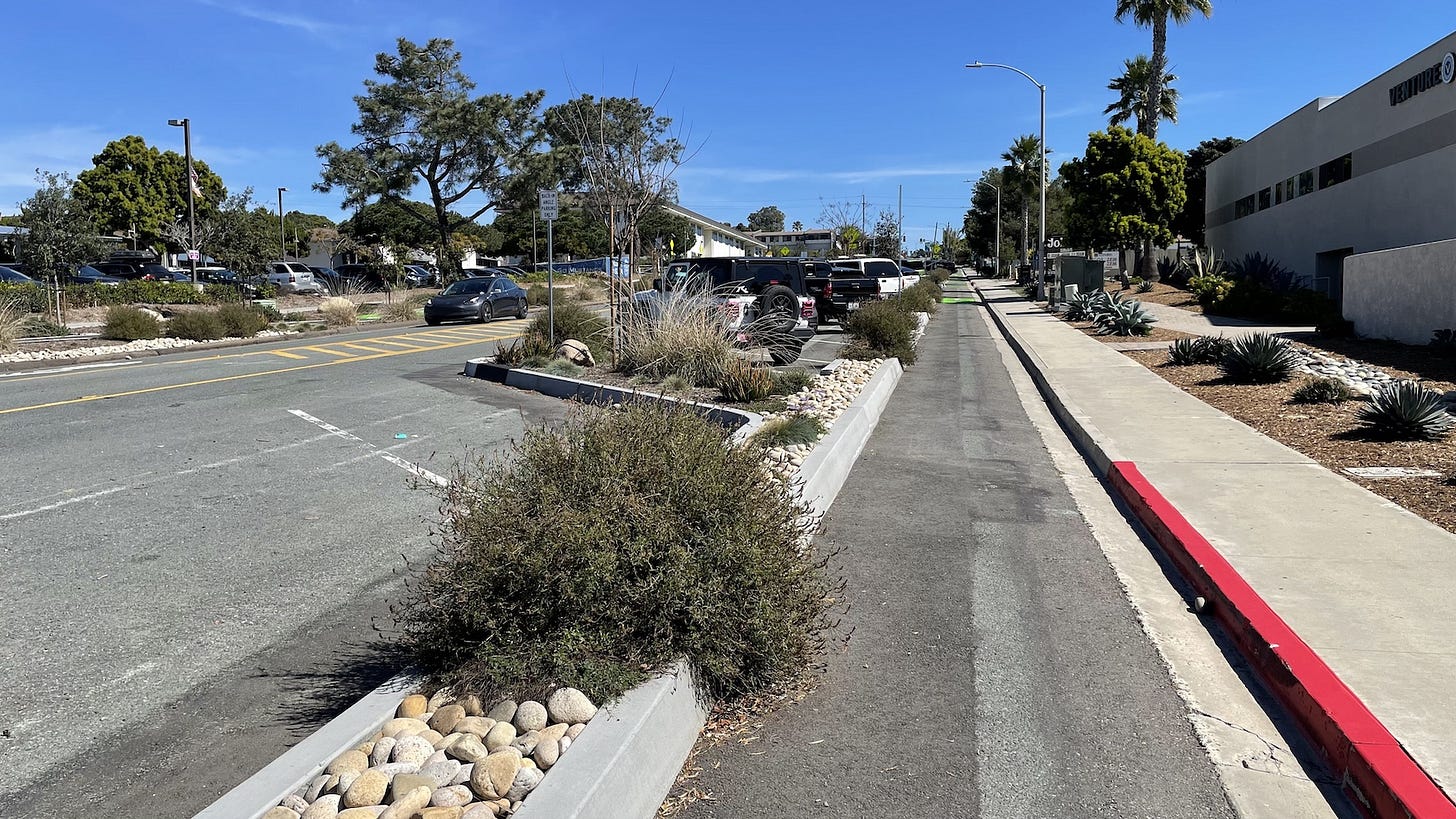 One proposal for a redesign on Santa Fe Drive calls for parallel parking along the curb, a buffered bike lane, and 11-foot-wide travel lanes. Steve Puterski photo