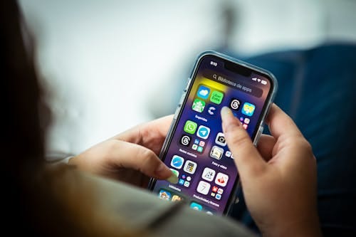 People Looking at a Smartphone · Free Stock Photo