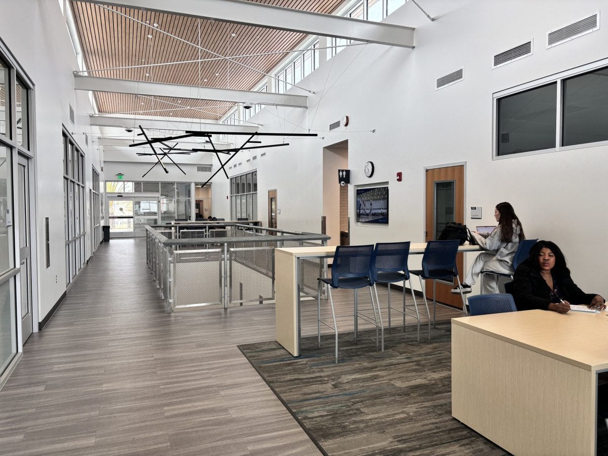 Students study in a common area on the second floor of the Behavioral and Social Science Building on Wednesday, May 28. The space features high-rise tables, cushioned chairs and natural lighting. (Camila Jimenez | The Union) Students study in a common area on the second floor of the Behavioral and Social Science Building on Wednesday, May 28. The space features high-rise tables, cushioned chairs and natural lighting. (Camila Jimenez | The Union)